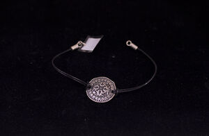 PULSERA PLATA MONEDA CON PIEL