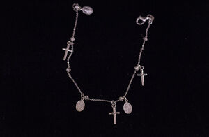 PULSERA PLATA CON CRUCES Y MEDALLAS